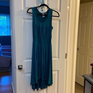 Hi lo hem dress with subtle details.